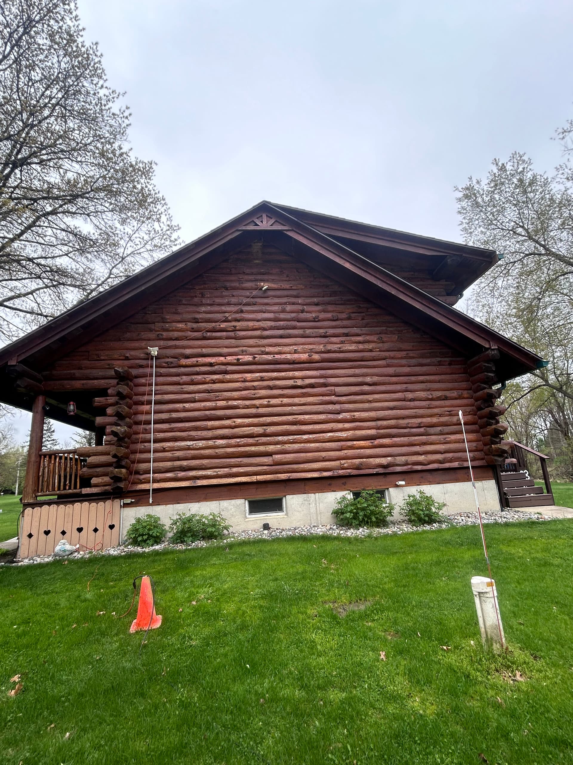 Log Cabin House Wash and Stain Done Right image