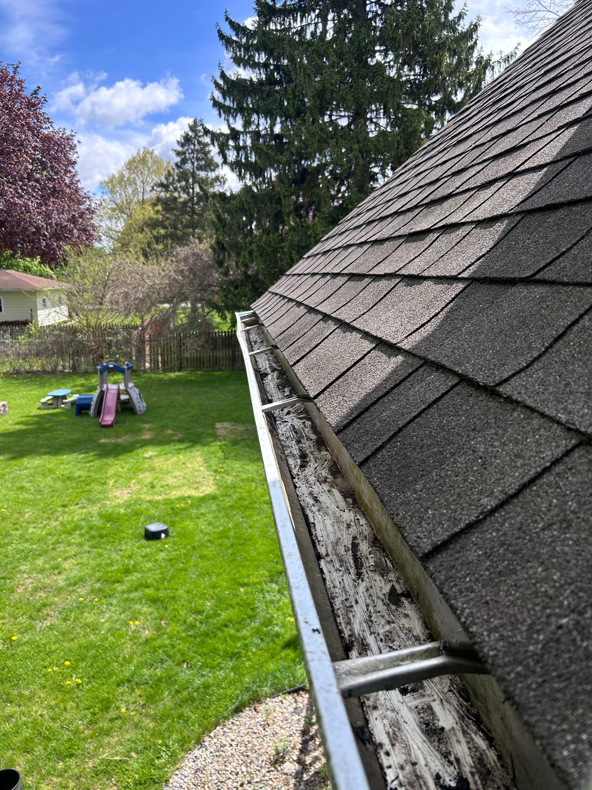 Gallery photos for Gutter Cleanouts in Owosso Keeping Homes Protected: Image #1